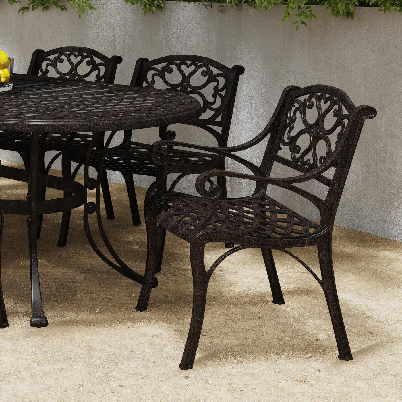 Sanibel Bronze Aluminum 7- Piece Outdoor Dining Set with 72 Oval Dining Table and Six Armchairs by Homestyles